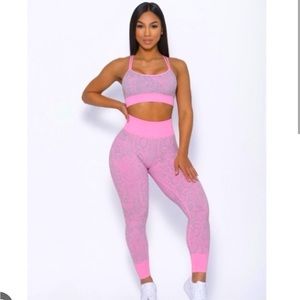 Bombshell pink snake print leggings in medium and matching sports bra in med.